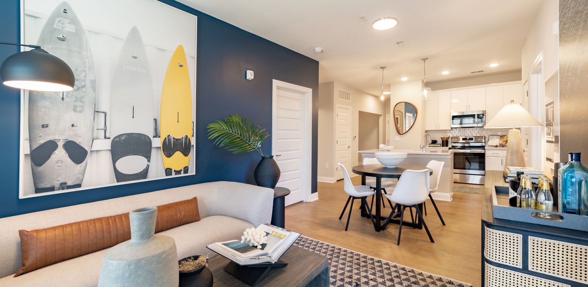 Hawthorne at The Mill apartment open floor layout with spacious living, dining, and kitchen area.